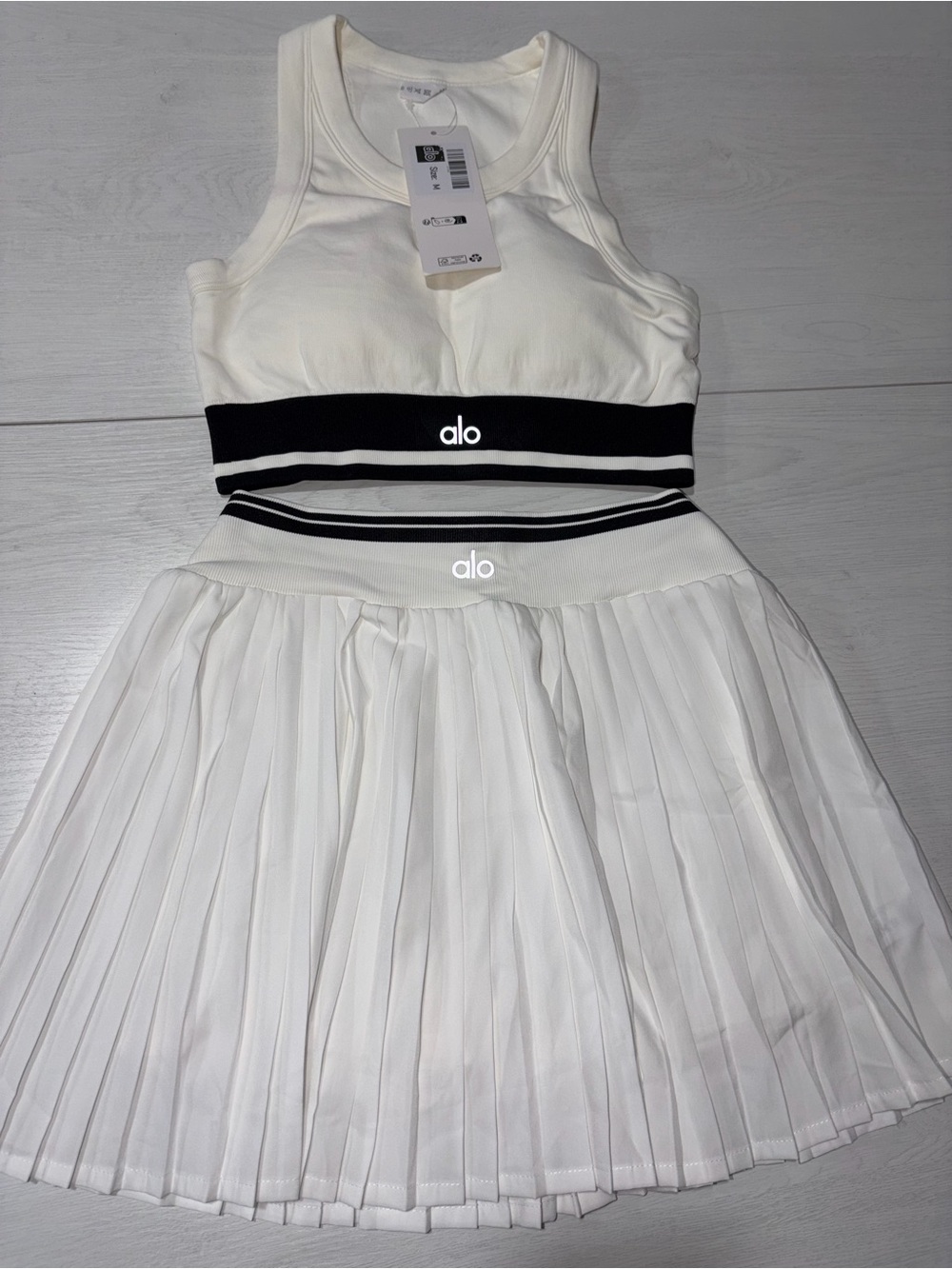 Alo yoga white and black short skirt and top